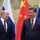 Le président chinois Xi Jinping (d) reçoit son homologue russe Vladimir Poutine à Pékin, le 4 février 2022.