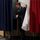 Le président Emmanuel Macron sort de l'isoloir après avoir voté au second tour des législatives le 19 juin 2022 au Touquet